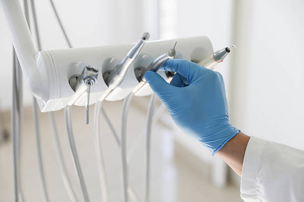 Professional Tooth Extraction technician working in Montgomery County County, MD